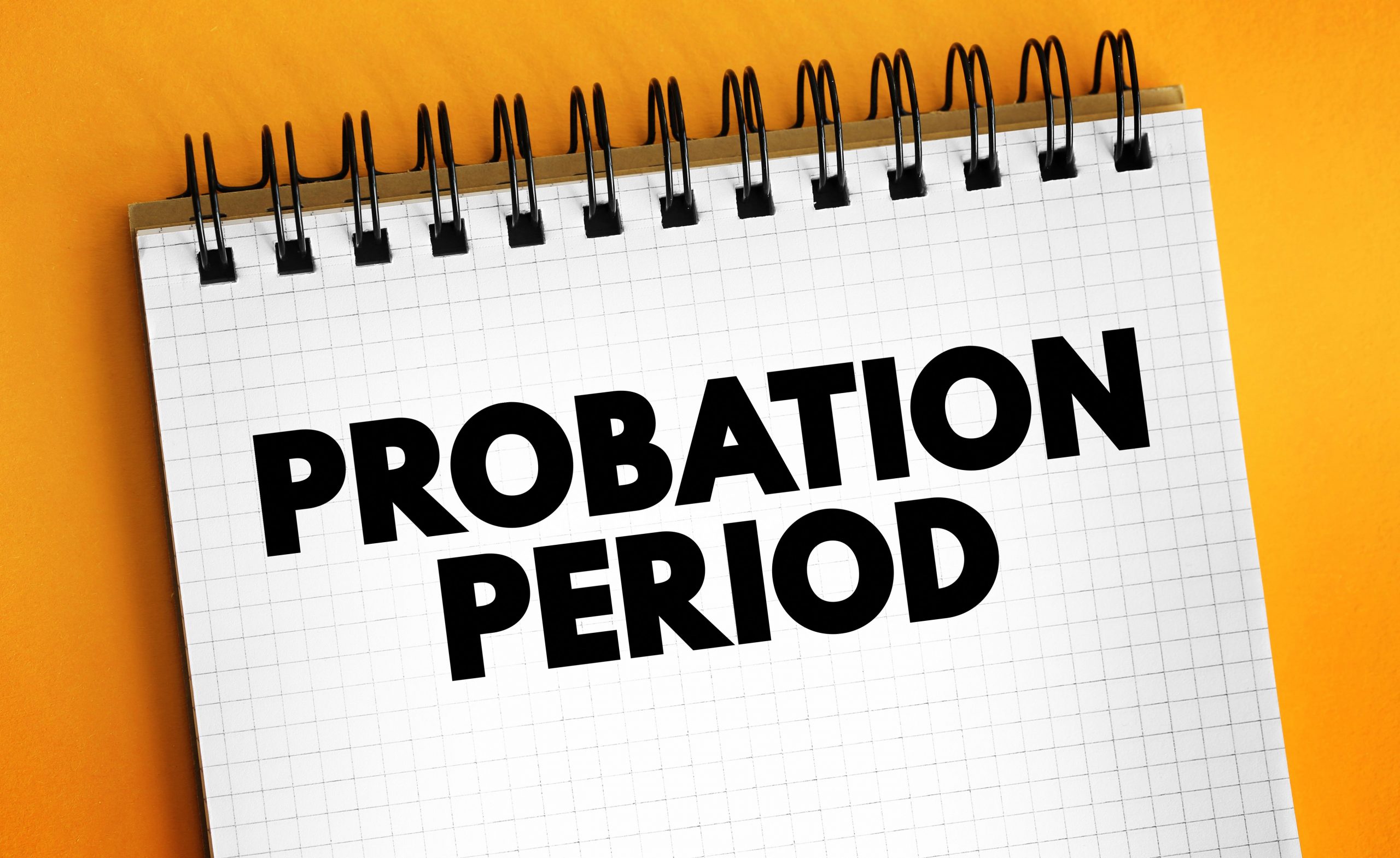 A note pad with the words Probation Period written on it